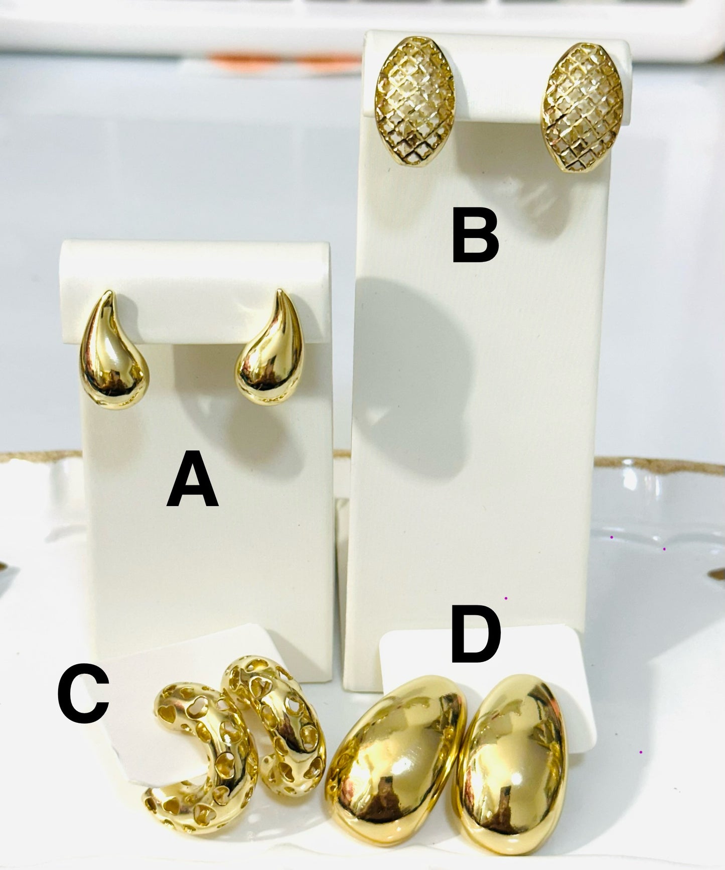 Aretes estilo espejo